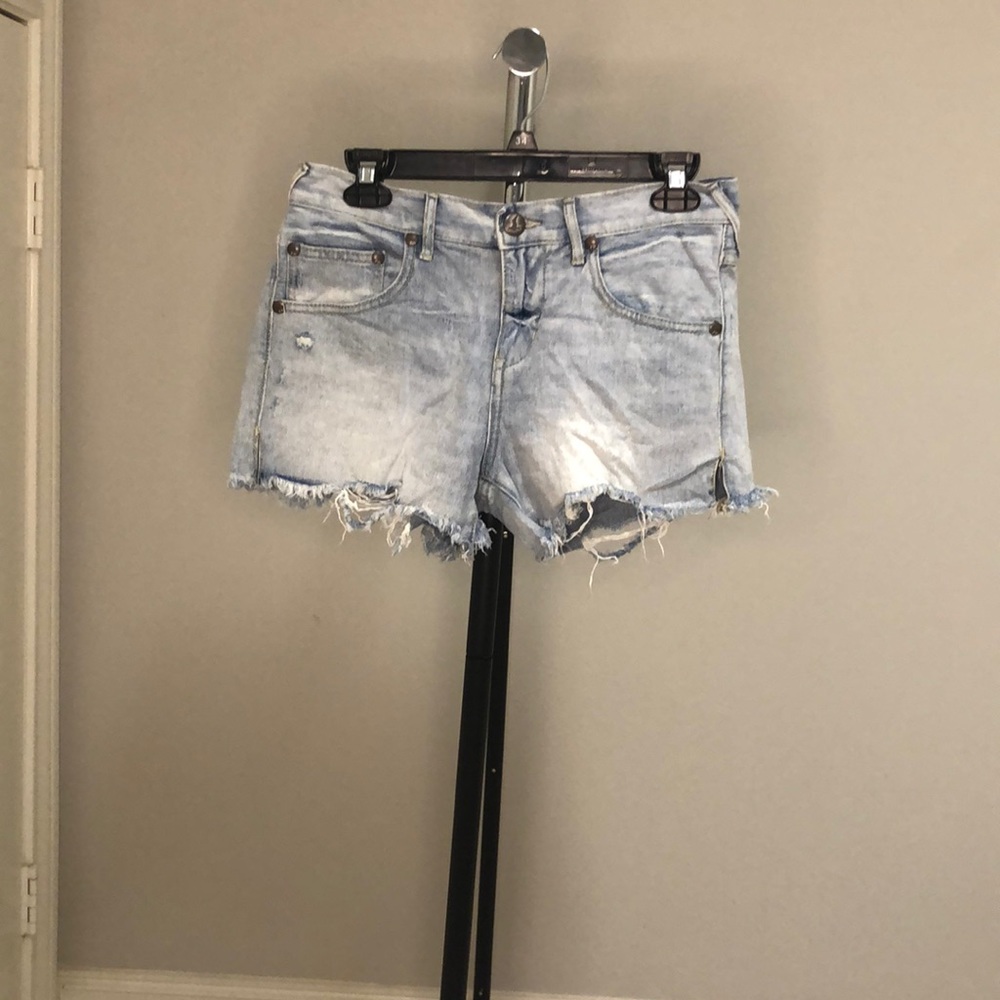 Free People light denim shorts